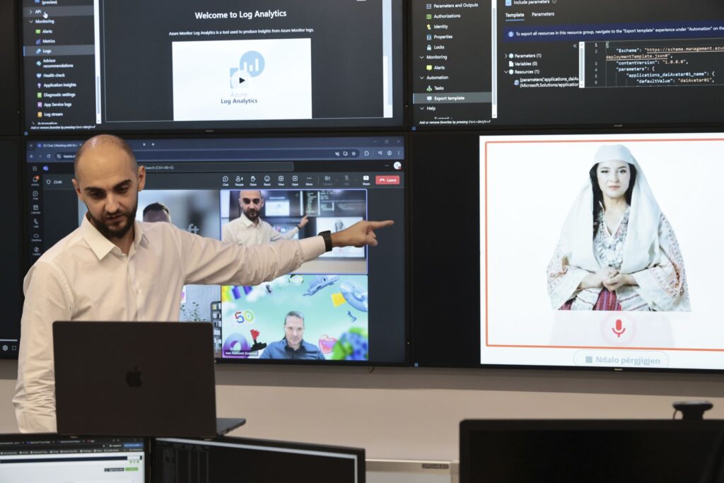 Enio Kaso, head of the Department of Artificial Intelligence and Cryptocurrency Licensing shows the AI "minister" Diella, whose name means "Sun" in Albanian, during a conference call in Tirana, Albania